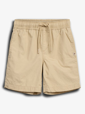 Beige shorts with an elastic waistband and drawstring, displayed on a plain white background. A small logo is visible near the right hem, adding a subtle design element.