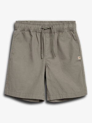 Gray shorts with an elastic waistband and drawstring, featuring two side pockets and a small logo patch on the right leg's seam, placed against a plain white background.